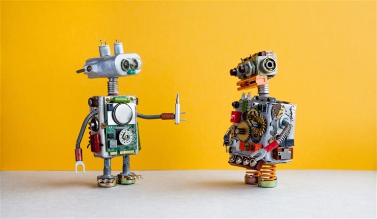 Two creative robot figures symbolizing collaboration and technology innovation